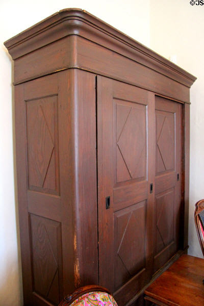 Sliding-door cabinet at Susanna Dickinson Museum House. Austin, TX.