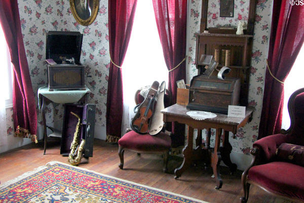 Musical instruments, gramophone, & music box in Muenzler House at Pioneer Village. Gonzales, TX.