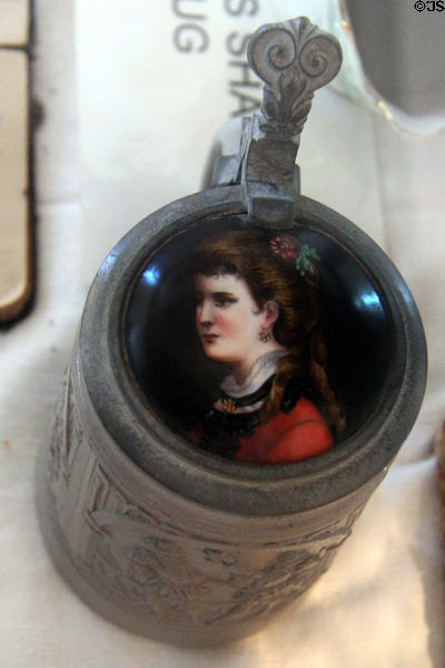 Beer stein with woman's portrait on the cover at Conservation Plaza. New Braunfels, TX.