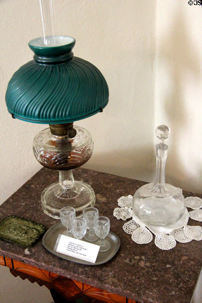 Liqueur glasses & decanter in Jahn House at Conservation Plaza. New Braunfels, TX.