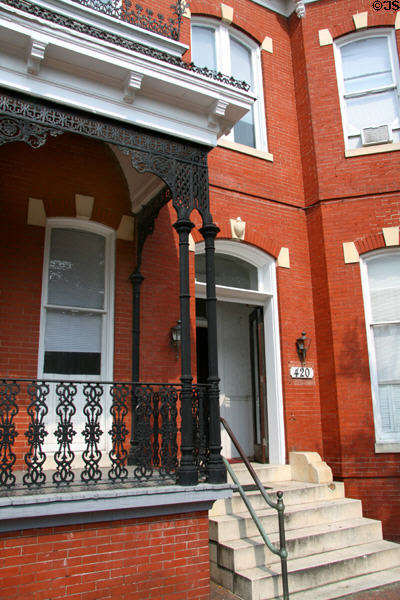 Detail of 420 Court St. with sacred heart over door. Portsmouth, VA.