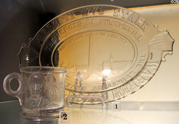 Pressed glass Bunker Hill tray (c1876) by Gillinder & Sons of Philadelphia, PA & Abraham Lincoln mug (c1881) at Bennington Museum. Bennington, VT.