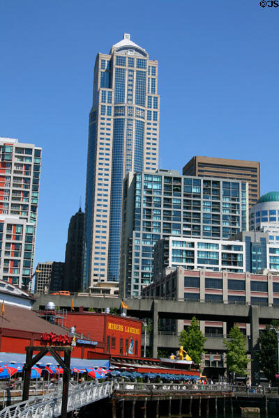 Washington Mutual Tower over waterfront residential buildings & Miner's Landing pier. Seattle, WA.