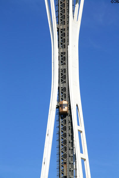 Elevator passes waist of Space Needle. Seattle, WA.