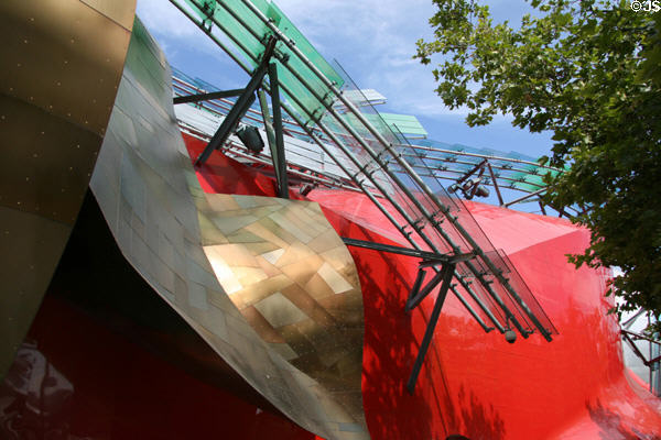Curving screens over red section of EMP|FSM from below. Seattle, WA.