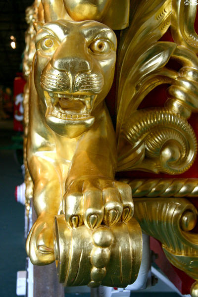 Golden carved lion extends claws on circus bandwagon at Circus World Museum. Baraboo, WI.