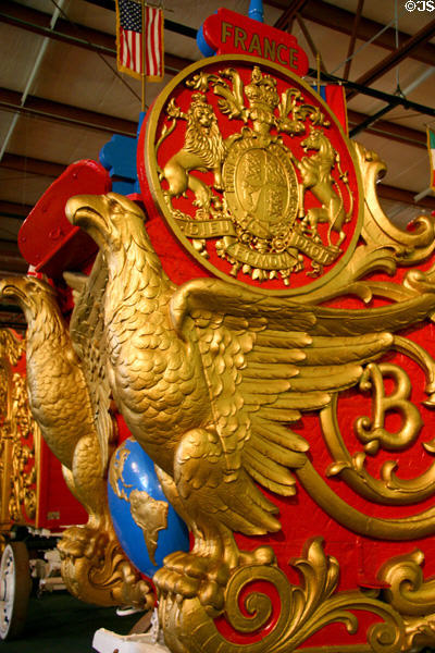 Carved golden eagles support driver's seat of Eastern Hemisphere circus wagon at Circus World Museum. Baraboo, WI.