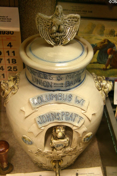 Salt-glaze water cooler (1990s) in museum room of Farmer's & Merchant's Union Bank. Columbus, WI.
