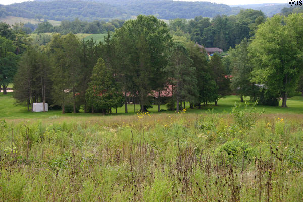 Setting of Hillside below prairie grasses at Taliesin. WI.