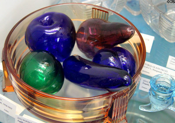 Toed bowl (1931-4) in amber with Fostoria glass fruit (1934-7) at Fostoria Glass Museum. Moundsville, WV.