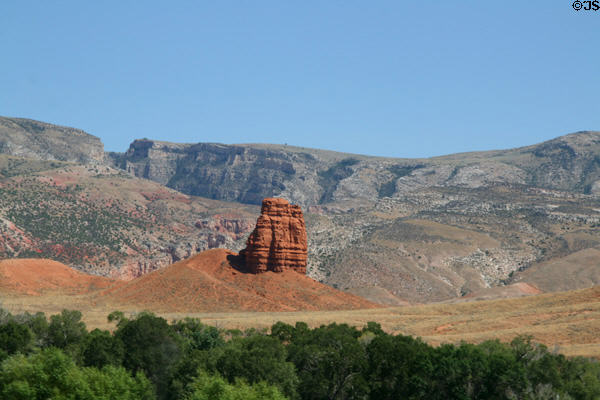 Rock formation approaching Big Horn mountains landscape along US 14. WY.