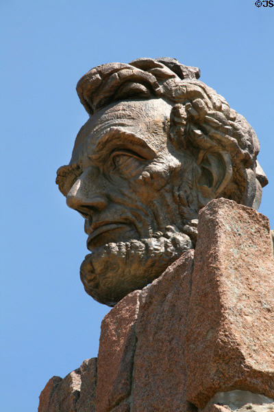 Detail of sculpted head of Abraham Lincoln overlooking pass that over time carried California Trail, Pony Express, Union Pacific transcontinental railroad, Lincoln Highway & I-80. WY.