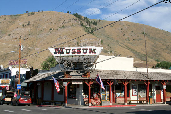 Jackson Hole Museum with covered wagon. Jackson, WY.