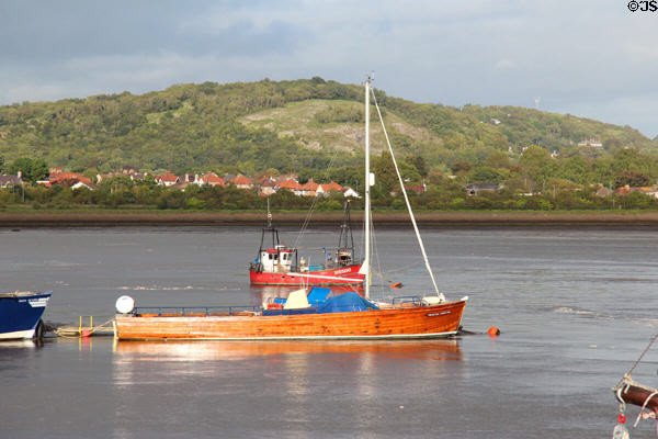 Sailboat moored in Conwy harbor. Conwy, Wales.