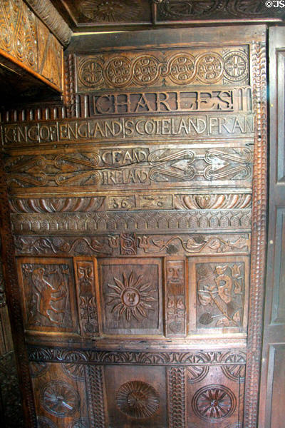 Panel carved with "Charles II King of England, Scoteland, France and Ireland " at Plas Newydd 1673" at Plas Newydd. Llangollen, Wales.