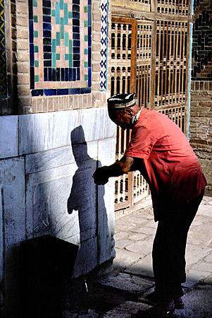 Ablutions at Registan mosque in Samarkand. Uzbekistan.