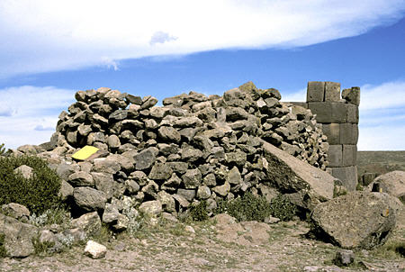 Incomplete tomb with stone ramp to get blocks to top at Silustani. Peru.