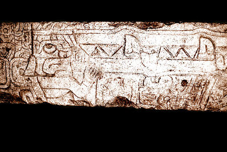 Puma figure detail of Tello Obilisque from Chavin de Huantar in Museum of Anthropology & Archeology, Lima (displayed sideways). Peru.