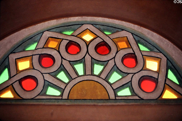 Colored glass fan light in haveli. Mandawa, India.