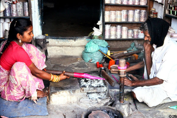 Roopangarth lak makers with bracelets. India.