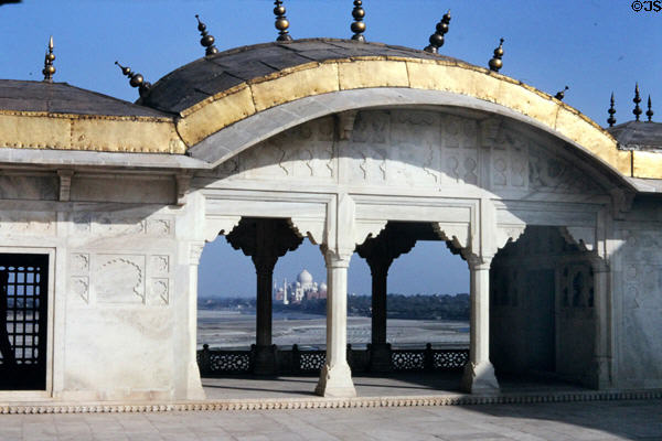 Looking through Red Fort to Taj Mahal in Agra. India.
