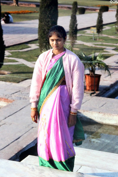 Young woman in courtyard at Taj Mahal, Agra. India.