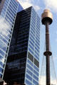 Glass skyscraper & Sydney Tower. Sydney, Australia.