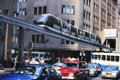 Monorail train runs above Sydney traffic. Sydney, Australia.