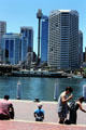 Sydney tower, boats & highrises across Darling Harbour. Sydney, Australia.