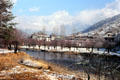 Looking across river at Tashichho Dzong in Thimpu. Bhutan.