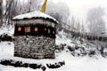 Roadside temple in snow at Dochu La Pass. Bhutan.