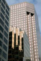 Park Place over gold reflective windows of 888 Dunsmuir. Vancouver, BC.