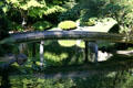 Arched wooden bridge in Nitobe Memorial Garden at UBC. Vancouver, BC.