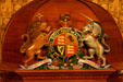 Royal coat of arms over House Speaker's Chair. Fredericton, NB.