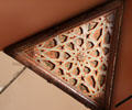 Carved wooden squinch panel from Arabic Spain at Aga Khan Museum. Toronto, ON.