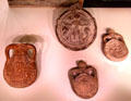 Earthenware Pilgrim flask shows arches of shrine in Palestine & 3 flasks to carry curative holy water from martyred St Menas shrine at Abu Mena, Egypt at Royal Ontario Museum. Toronto, ON.