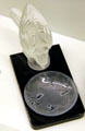 Glass ashtray with figure of bird by Lalique of France at Royal Ontario Museum. Toronto, ON.