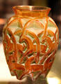 Chamois glass vase with scimitar-horned oryx by R, Lalique of France at Royal Ontario Museum. Toronto, ON.