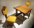 Table & side chair by Frank Lloyd Wright both made for Imperial Hotel in Tokyo, Japan at Royal Ontario Museum. Toronto, ON.