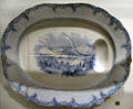 Earthenware meat platter with blue transfer-print of view of city of Halifax, NS beyond steam ships at Royal Ontario Museum. Toronto, ON.