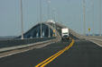Road of Confederation Bridge to PEI arches upward over shipping spans. PE.