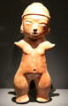 Painted terracotta standing female figure from Tlatilco, Mexico at Montreal Museum of Fine Arts. Montreal, QC.