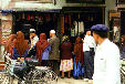 Shopping in street markets near a mosque in Kashgar. China.