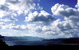 Puffy clouds high above Lake Arenal seen from the volcano. Costa Rica.