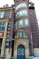 Spiral staircase tower & ornately carved entrance on Hube-Haus. Hamburg, Germany