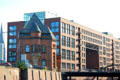 Vintage Harbor Police Station against backdrop of modern buildings in HafenCity district. Hamburg, Germany.