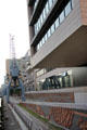 Decorative elements on wall in front of buildings overlooking Elbe River in HafenCity. Hamburg, Germany.