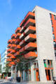 Modern residential building at Am Dalmannkai 12-16 with shops at street level in HafenCity. Hamburg, Germany.