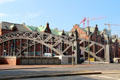Brooksbrücke cast iron bridge with sculptures on corner pillars. Hamburg, Germany.