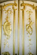 Roccoco doors with musical instruments in Sanssouci Palace. Potsdam, Germany.